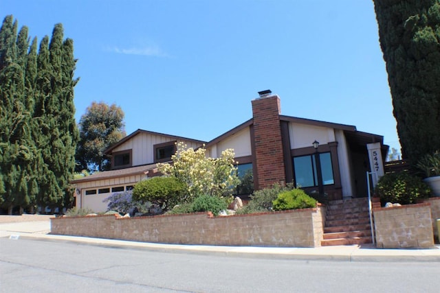 view of front of house with a chimney