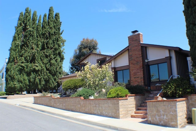 view of front of house with a chimney