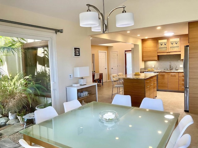 dining room featuring light tile patterned floors and recessed lighting