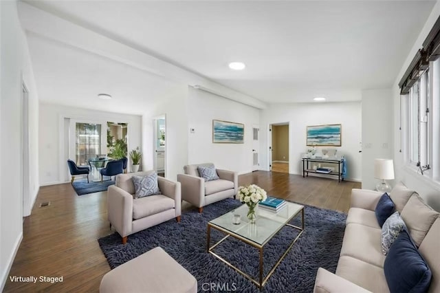 living area with visible vents, baseboards, recessed lighting, and wood finished floors