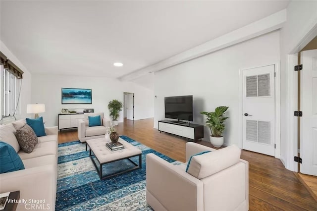 living room featuring visible vents, recessed lighting, wood finished floors, and beamed ceiling