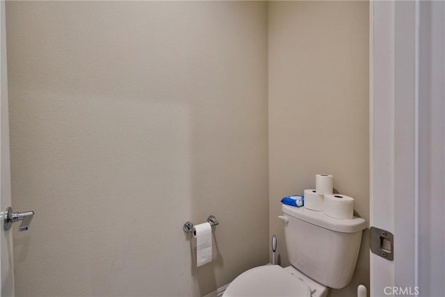 bathroom featuring toilet