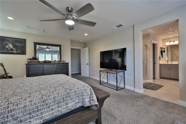 bedroom with visible vents, baseboards, and carpet floors