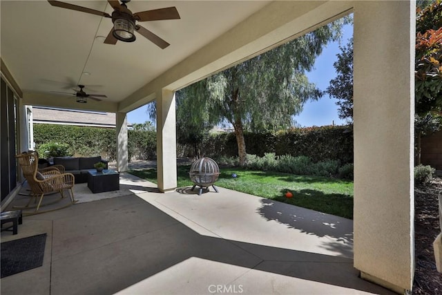 view of patio / terrace featuring a fenced backyard, a ceiling fan, and an outdoor hangout area
