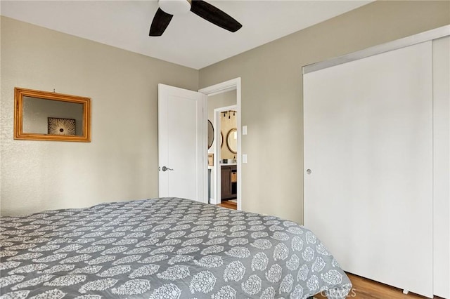 bedroom with wood finished floors and ceiling fan