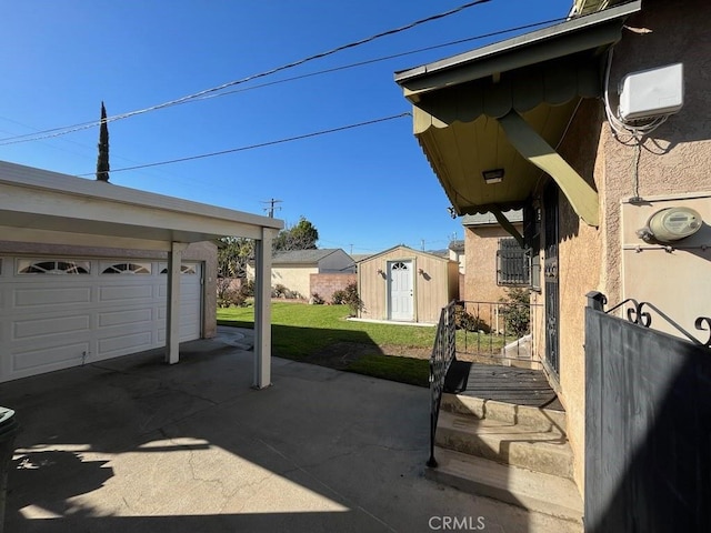 exterior space featuring fence, an outdoor structure, and a storage shed