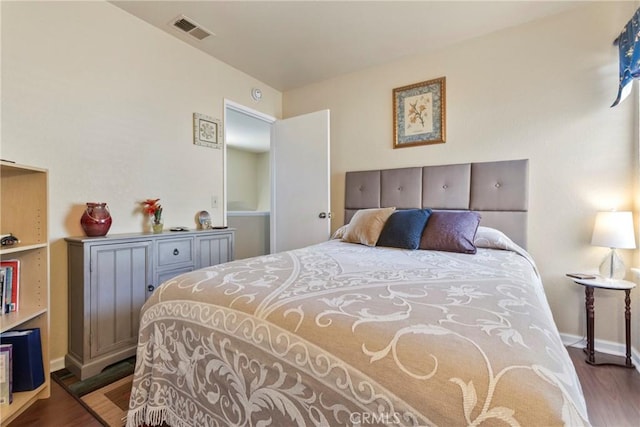 22690 Mountain View Rd, Moreno Valley, CA 92557 - bedroom with baseboards, wood finished floors, and visible vents