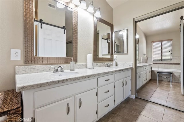 22690 Mountain View Rd, Moreno Valley, CA 92557 - bathroom featuring a sink, tile patterned floors, double vanity, and visible vents