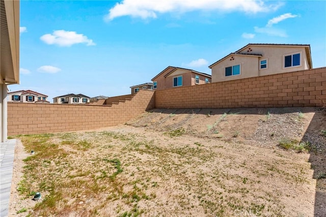view of yard featuring a fenced backyard