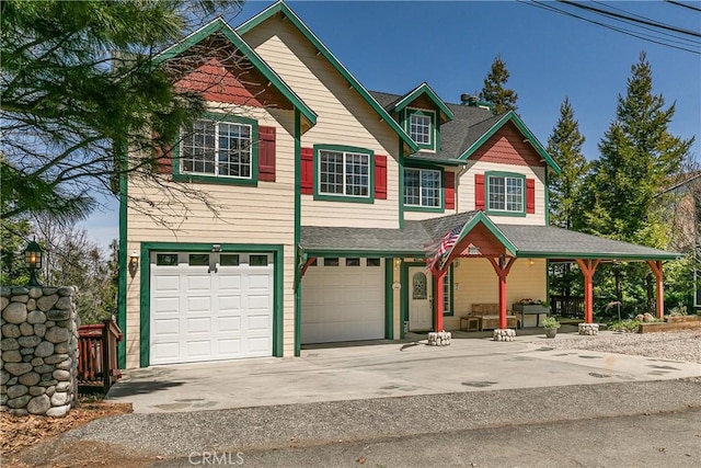1251 Kodiak Dr, Lake Arrowhead, CA 92352 - view of front of property with concrete driveway and a garage