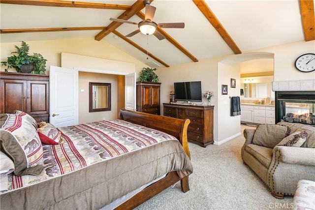 1251 Kodiak Dr, Lake Arrowhead, CA 92352 - bedroom with light colored carpet, beam ceiling, a tile fireplace, baseboards, and high vaulted ceiling