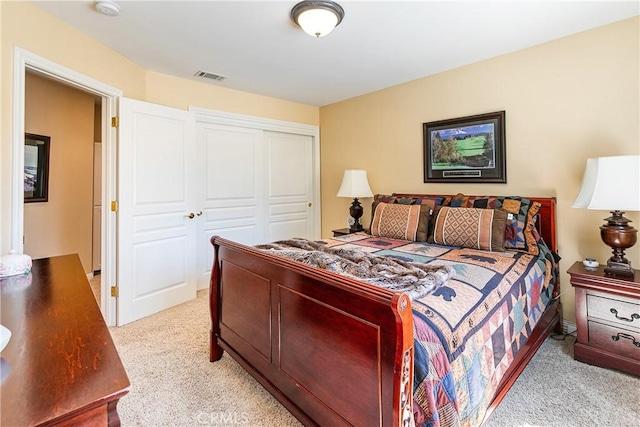 1251 Kodiak Dr, Lake Arrowhead, CA 92352 - bedroom with visible vents, a closet, and light carpet