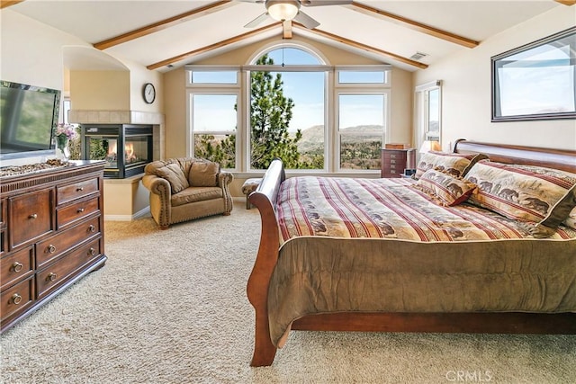1251 Kodiak Dr, Lake Arrowhead, CA 92352 - bedroom featuring light colored carpet, multiple windows, and a tile fireplace