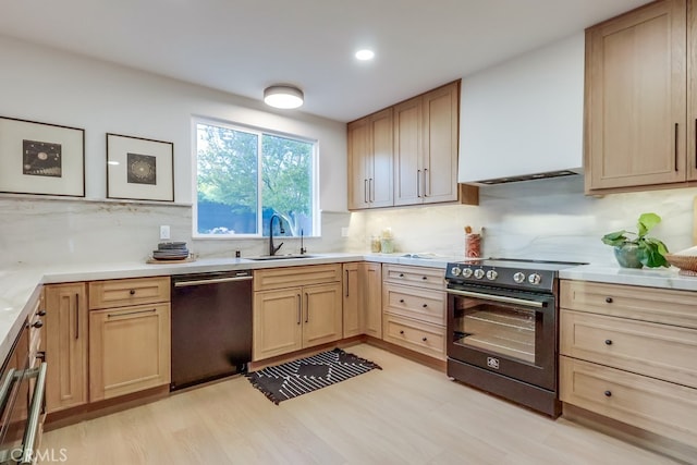 4903 Spencer St, Torrance, CA 90503 - kitchen featuring light brown cabinets, stainless steel range with electric stovetop, a sink, light countertops, and dishwashing machine
