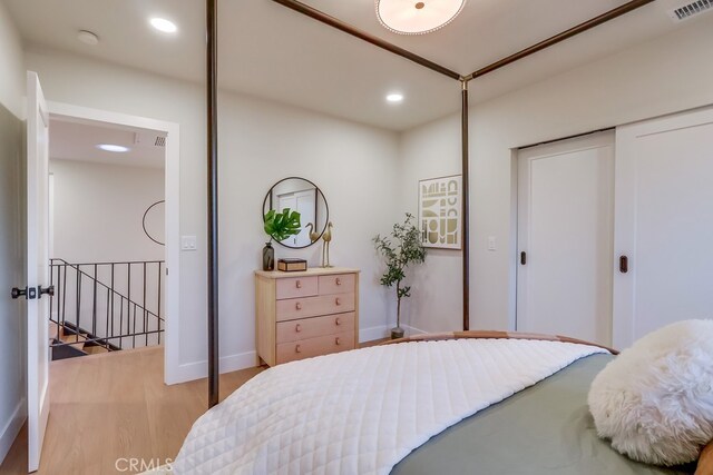 4903 Spencer St, Torrance, CA 90503 - bedroom featuring light wood-style floors, a closet, visible vents, recessed lighting, and baseboards