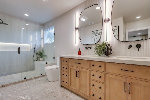 4903 Spencer St, Torrance, CA 90503 - bathroom with a sink, toilet, a shower stall, double vanity, and recessed lighting