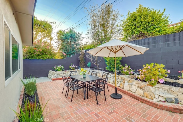 4903 Spencer St, Torrance, CA 90503 - view of patio with a fenced backyard and outdoor dining space