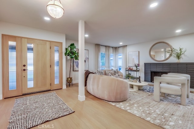 4903 Spencer St, Torrance, CA 90503 - entryway featuring recessed lighting, a brick fireplace, baseboards, and wood finished floors