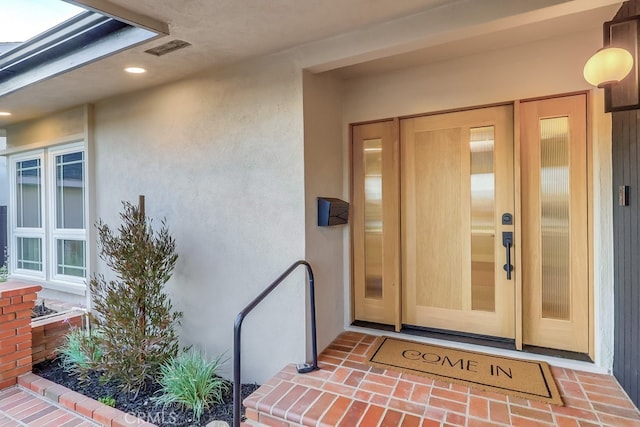4903 Spencer St, Torrance, CA 90503 - entrance to property featuring stucco siding and visible vents
