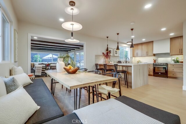 4903 Spencer St, Torrance, CA 90503 - dining space with light wood-type flooring and recessed lighting