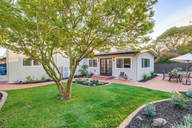 4903 Spencer St, Torrance, CA 90503 - ranch-style home featuring a patio, stucco siding, french doors, a front lawn, and fence