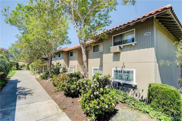 606 Avenida Sevilla Unit O, Laguna Woods, CA 92637 - view of property exterior featuring a tiled roof