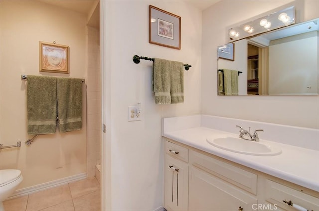 606 Avenida Sevilla Unit O, Laguna Woods, CA 92637 - bathroom with vanity, toilet, a shower, tile patterned floors, and baseboards