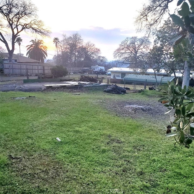 yard at dusk with fence