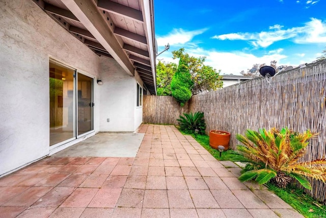view of patio with a fenced backyard