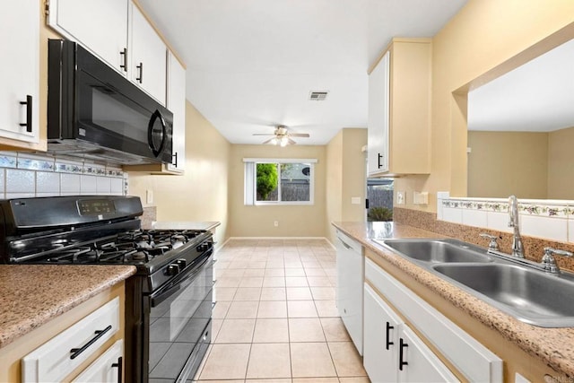 kitchen with a sink, tasteful backsplash, visible vents, a ceiling fan, and black appliances