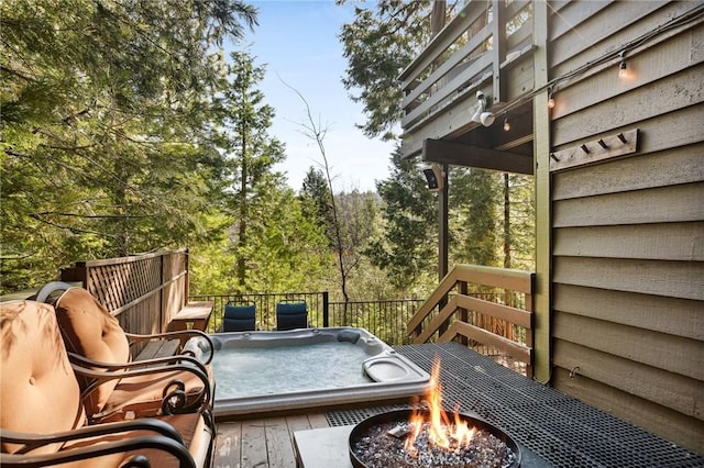 229 Chippewa Ln, Lake Arrowhead, CA 92352 - wooden deck with a fire pit