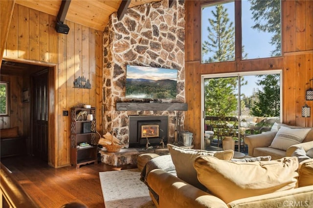 229 Chippewa Ln, Lake Arrowhead, CA 92352 - living room with beamed ceiling, wood-type flooring, wood ceiling, and wooden walls