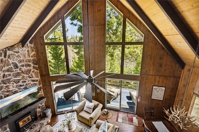 229 Chippewa Ln, Lake Arrowhead, CA 92352 - living area featuring wooden ceiling, lofted ceiling with beams, and plenty of natural light