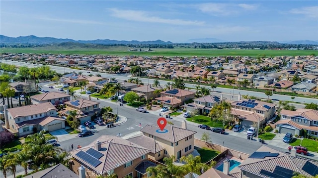 bird's eye view with a residential view and a mountain view