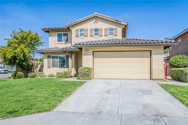 mediterranean / spanish house featuring concrete driveway, a front yard, stucco siding, and a tile roof