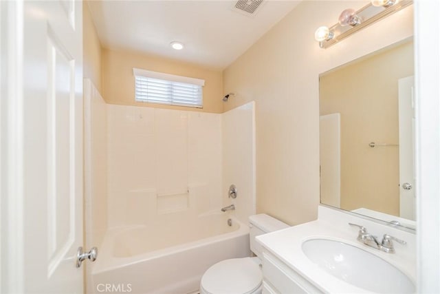 bathroom featuring visible vents, toilet, vanity, and bathing tub / shower combination