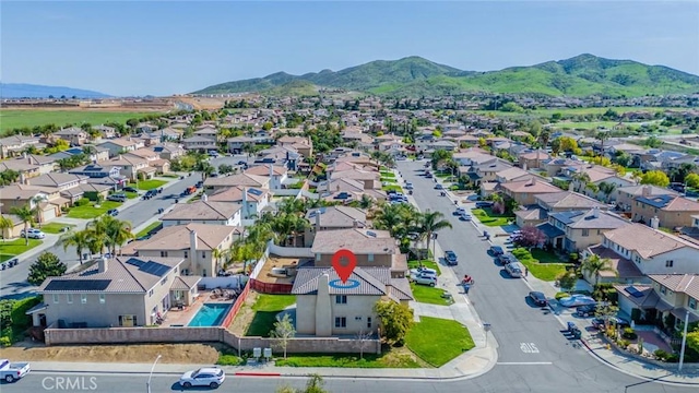 aerial view featuring a residential view and a mountain view