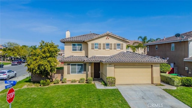 mediterranean / spanish home featuring a tiled roof, stucco siding, a front yard, a chimney, and concrete driveway