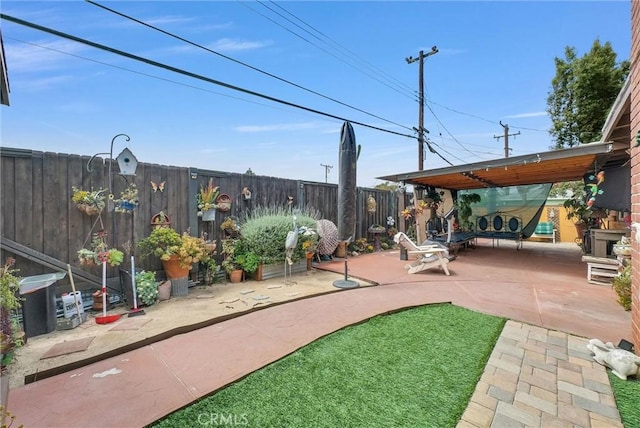 view of patio with a fenced backyard