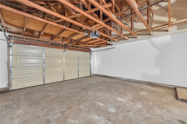 garage featuring a garage door opener