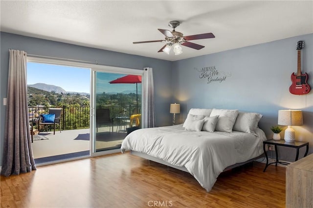 88611/2 Los Coches Rd, Lakeside, CA 92040 - bedroom with a ceiling fan, a mountain view, wood finished floors, and access to exterior