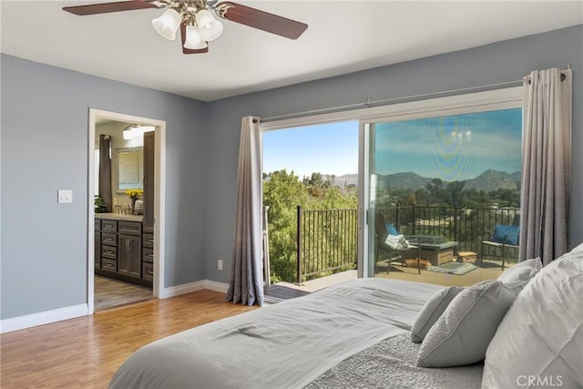 88611/2 Los Coches Rd, Lakeside, CA 92040 - bedroom featuring light wood finished floors, access to exterior, baseboards, ensuite bathroom, and a mountain view
