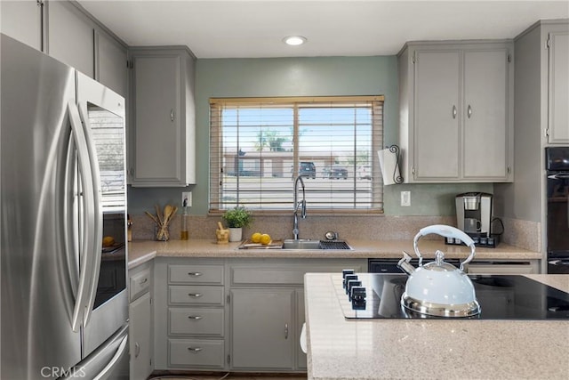 88611/2 Los Coches Rd, Lakeside, CA 92040 - kitchen with a sink, light countertops, gray cabinets, and black appliances