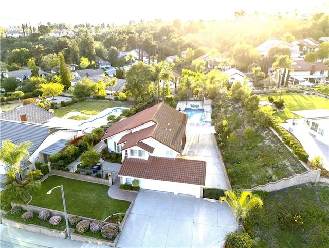 birds eye view of property with a residential view