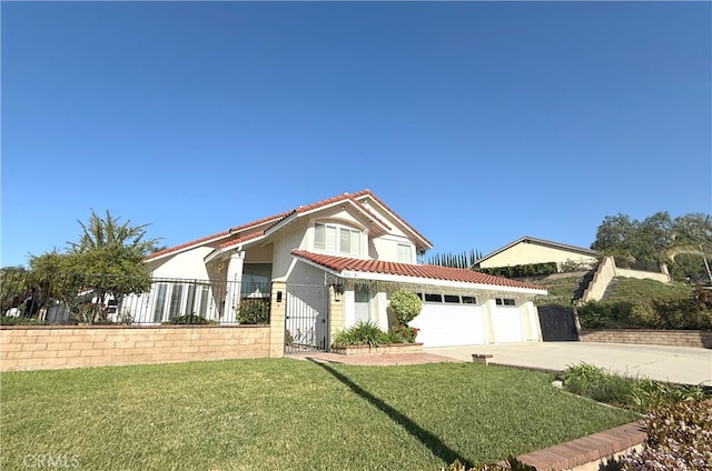mediterranean / spanish-style house with a front yard, a tiled roof, a garage, fence, and driveway