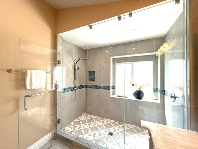 full bathroom featuring a stall shower