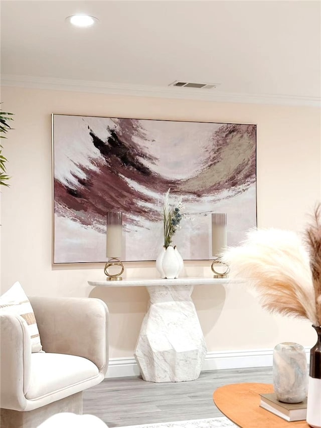 interior details featuring crown molding, wood finished floors, visible vents, and recessed lighting