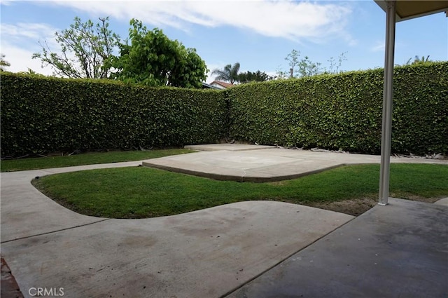 18410 Alexander Ave, Cerritos, CA 90703 - fenced backyard with a patio