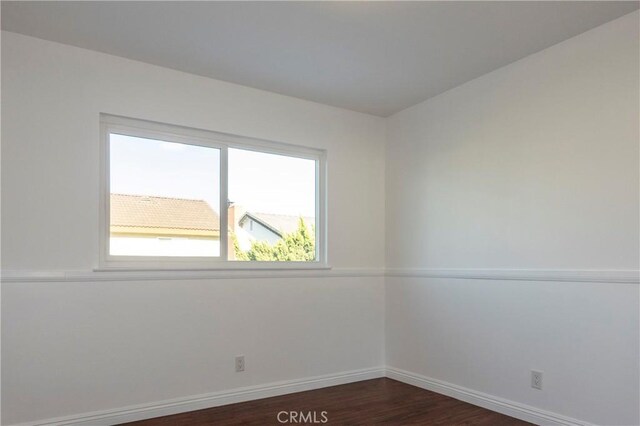 18410 Alexander Ave, Cerritos, CA 90703 - empty room featuring baseboards and dark wood-style flooring
