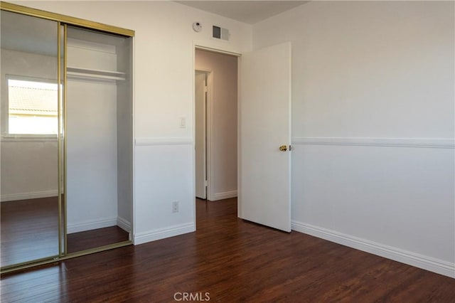 18410 Alexander Ave, Cerritos, CA 90703 - unfurnished bedroom featuring a closet and wood finished floors
